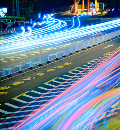 busy big city traffic trail night cityscape at Guangzhou Chinaの写真素材