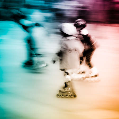 child playing rollerblade blur motion