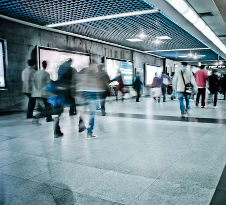 Business passenger walk at subway station at intentional motion blurredの写真素材