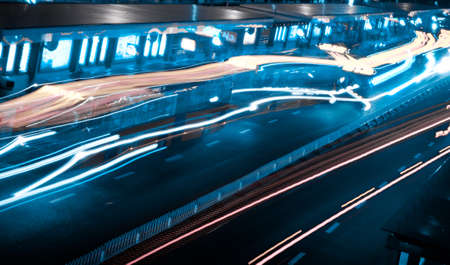 busy big city traffic trail night cityscape at Guangzhou Chinaの写真素材