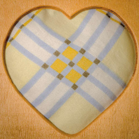 wood heart shape frame with stripe
cloth backgroundの写真素材