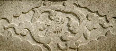 Chinese stone dragon carving reliefの写真素材