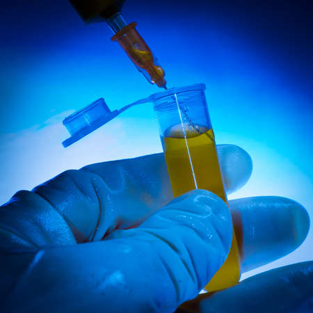 medical background syringe in hand