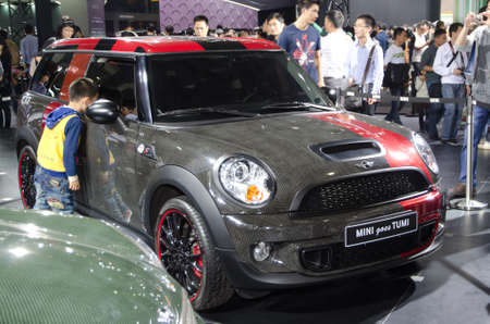 GUANGZHOU, CHINA - Nov 26: Mini goes Tumi car on display at the 9th China international automobile exhibition. on November 26, 2011 in Guangzhou China.のeditorial素材