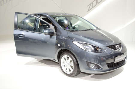 GUANGZHOU, CHINA - Nov 26: mazada 2 car on display at the 9th China international automobile exhibition. on November 26, 2011 in Guangzhou China.のeditorial素材
