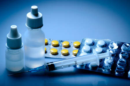 Packs of different medical bottle and syringe backgroundのeditorial素材