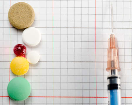 Packs of different medical bottle and syringe backgroundの写真素材