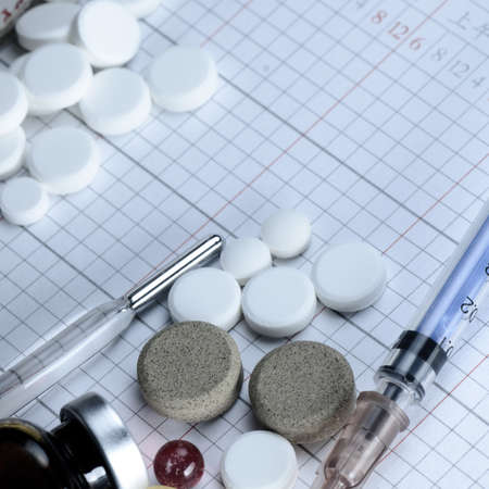 Packs of different medical bottle and syringe backgroundの写真素材