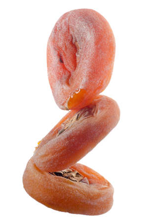 dried persimmon isolated on whiteの写真素材