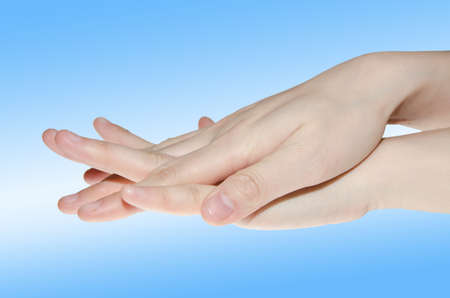 professional medical hand washing gesture isolated on whiteの写真素材