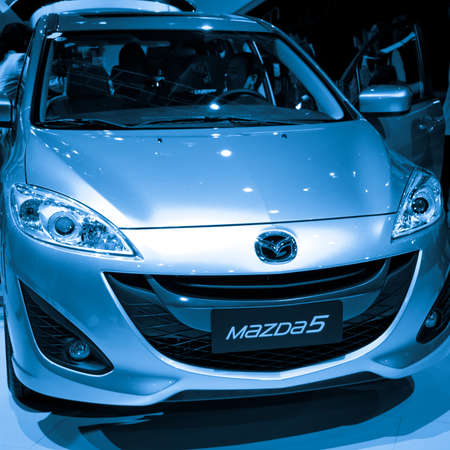 GUANGZHOU, CHINA - Nov 26: Mazda 5 car on display at the 9th China international automobile exhibition. on November 26, 2011 in Guangzhou China.のeditorial素材