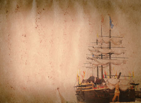 old sail ship on grunge paper texture backgroundの写真素材