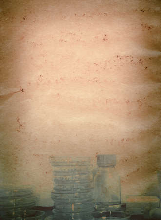 science genetically modified plants test in petri dishes  old grunge paper texture backgroundの写真素材