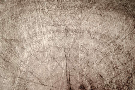 shabby cut tree trunk scored surface texture backgroundの写真素材