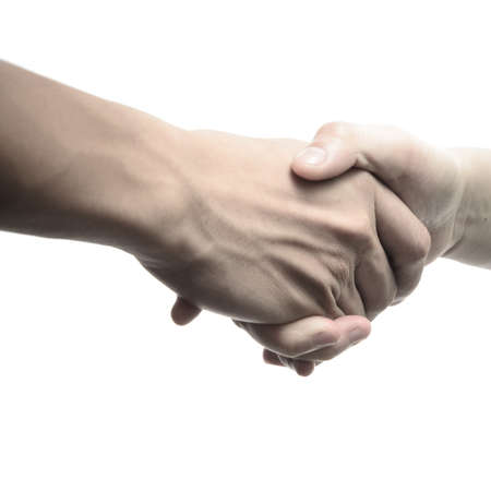 business man and woman shaking hands, isolated on whiteの写真素材