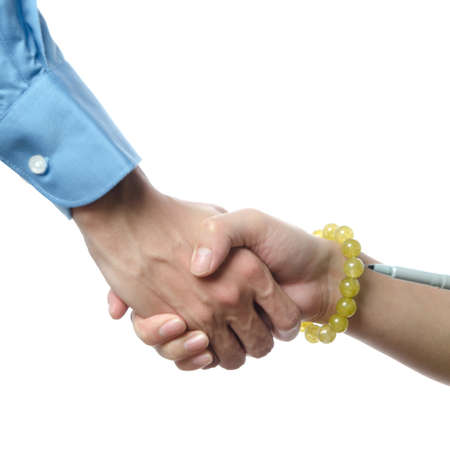 business man and woman shaking handsの写真素材