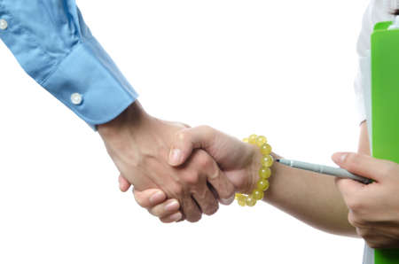 business man and woman shaking handsの写真素材