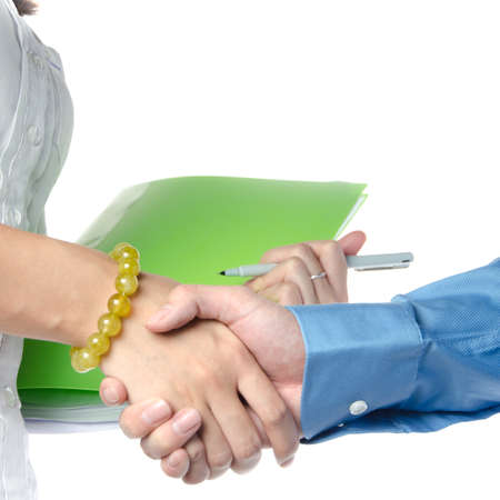 business man and woman shaking handsの写真素材