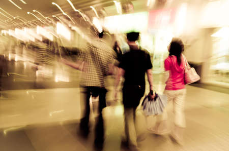 business people walk on street, abstract blur