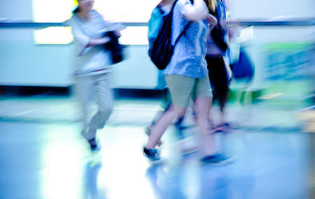 Business passenger crowd at subway station motion blurred abstractの写真素材