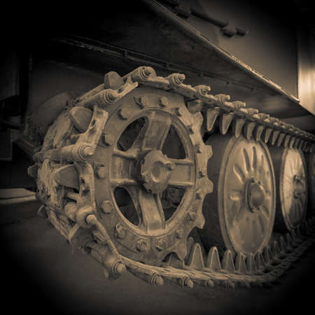 tank track and wheels close upの写真素材