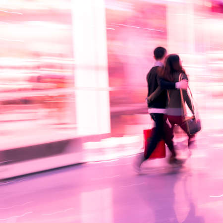 shopping lover man and woman walk in marketplaceの写真素材