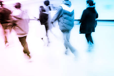 business people walk at subway station abstract blurの写真素材