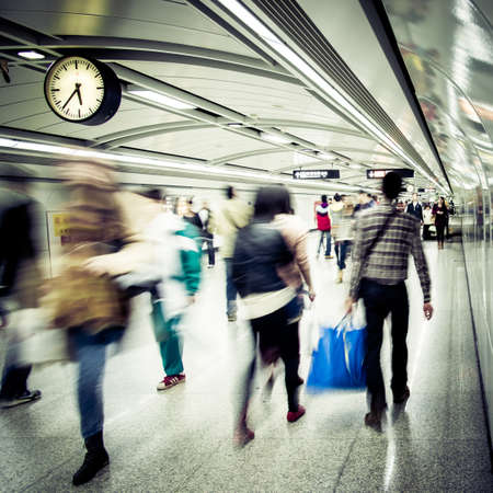 business people walk at subway station abstract blurのeditorial素材