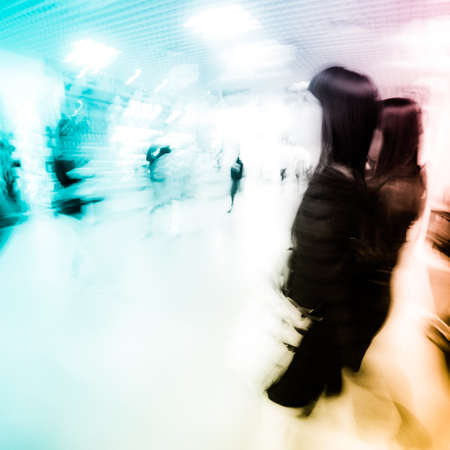 fashion women in shopping center abstract blurの写真素材