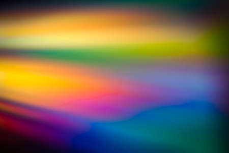 reflected rainbow light background of discの写真素材