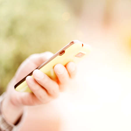 using cell phoneの写真素材