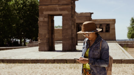 young tourist visiting archaeological ruins on the continent of Europeの写真素材