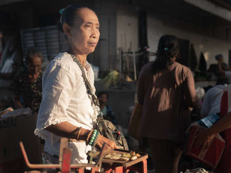 Ubud, Bali, Indonesia - September 21, Middle-age balinese woman at the main market of Ubud, Baliのeditorial素材