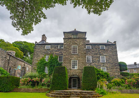 Plas Brondanew, Gwynedd, North Wales, United Kingdom - July 21, 2018: Central perspective view on the main part of the house of Plas Brondanw, Gwynedd, North Walesのeditorial素材