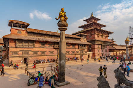 Lalitpur, Patan, Nepal - April  3, 2019: The Royal Palace of Patan, today a museum on the Durbar Square of Patan, taken during a partly cloudy afternoonのeditorial素材