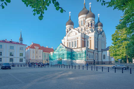 View on the Alexandre Nevsky cathedral framed by tree branches taken on a sunny summer day at the end of the afternoon, Tallinn, Estoniaの写真素材