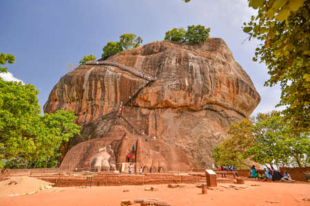 Sigiriya, Sri Lanka - July 7, 2016:  Visitors climbing Sigiriya Rock on a sunny summer afternoon.のeditorial素材