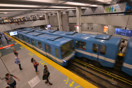 Montreal, Quebec, Canada - Aug 23, 2016: Motion blurred movement of metro cars. One metro car is arriving while the other one is leaving at one of Montreal's metro stationのeditorial素材