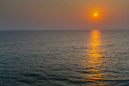 Sunset on dark waters seen from above, with no people Kerala, India