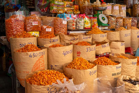Ho Chi Minh City, Vietnam - April 10, 2018: Various types of dry shrimps in bags at a farmer's...