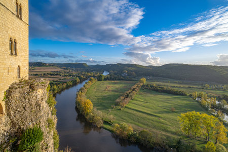 The countryside of the Perigord, France and the Dordogne River seen from the Beynac castle, South West France. Taken at golden hour, on a sunny autumn day, with no peopleの写真素材