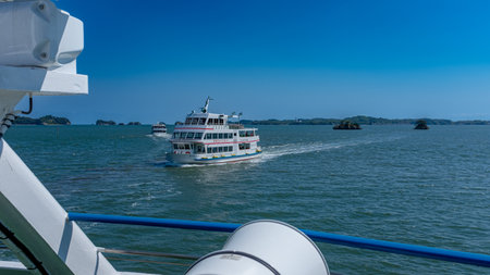 Boat touring the Islands of the bay of Matsushima, Japan, taken in springtime with no people.の写真素材