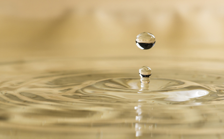 Water drop. Water splash in dark.の写真素材