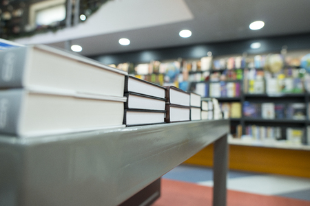 Books on shelfs in bookstoreの写真素材
