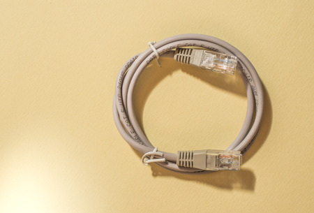 USB cable on bright colour background