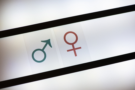 Male and female symbols on back light illuminated. Concept for sexuality and gender.の写真素材