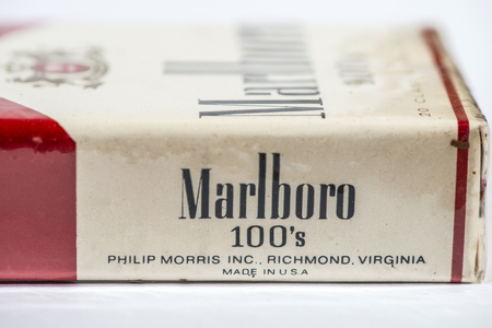 Vintage Marlboro cigarettes 100s produced in the USA. Banderole on top of the pack.  Red package. Close shot of filter cigarettes pack. US tax exempt for use outside USA. Philip morris producer.のeditorial素材