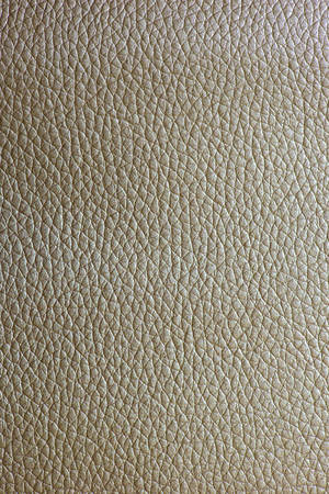 Shiny golden colour leather bright background. Geometric shapes. Brillante superficie backdrop. Abstract compositions.の写真素材