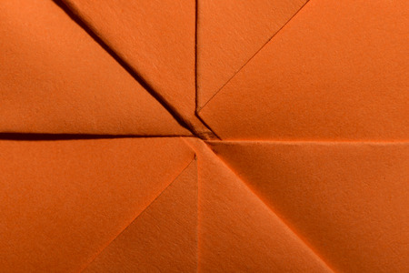 Abstract geometric paper shapes. Pastel tones crumpled paper. Hard light.の写真素材