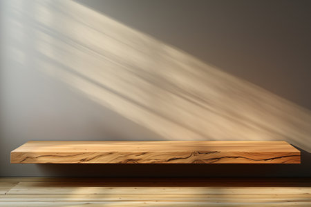 A wooden table podium for luxury product sitting on top of a hard wood floor on stone wall background.の素材